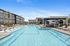 Pool with Clubhouse Exterior