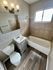 Cozy bathroom with plenty natural light