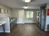 Bright and spacious communal laundry room with modern washers and dryers.