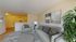 Inviting living room with modern furniture, elegant decor, and a cozy atmosphere, perfect for relaxation and entertaining.
