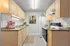 Galley Kitchen with Under Cabinet Lighting
