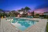Sparkling Swimming Pool with Chaise Lounges