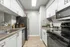 Stainless Steel Appliances and Gooseneck Sink Faucet