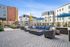 Luxury, outdoor amenity spaces with a firepit and lounge seating for entertainment.