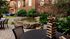 Outdoor lounge at our apartments for rent in Athens, GA, featuring outdoor seating with a Jenga game on the table.