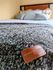 Bed with evergreen blanket