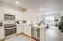 Sophisticated kitchen and living area in an Ossining apartment for rent.