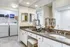 Spacious Primary Bathroom with Full-Sized Washer & Dryer