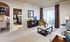 Light and open living room in a luxury Mansfield MA apartment.