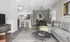 Luxury Marlborough MA apartment living room with grey sectional.