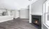 Large Pembroke MA apartment with wood flooring and a fireplace.