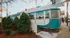 Photograph of a diner in a train car in the town of Watertown, featuring a view of the sidewalk and people walking.The Town Diner near our apartments for rent in Watertown, MA, featuring a old fashioned diner exterior.