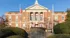 Historic building near our apartments for rent in Watertown, MA, featuring a stately brick facade with columns.