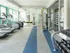 Avia Lowry's fitness center equipped with exercise machines and weights.