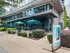 The exterior of the Cyan on Peachtree apartments in Atlanta, GA, featuring a sign that reads "Cyan on Peachtree."