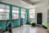 Avia Lowry's fitness center equipped with exercise machines and weights.