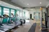 Avia Lowry's fitness center with exercise equipment and a space for yoga.