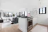 Stainless steel appliances and white cabinets