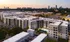 View of the neighborhood around Newbergh ATL, featuring a view of the surrounding buildings and the Atlanta skyline.