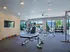 Fitness Center Eliptical and Weight benches