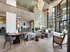 Lounge and lobby at our apartments in Atlanta, featuring stone floor paneling, couches, and elegant decor.