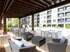 Outdoor lounge at our apartments for rent in Atlanta, GA, featuring outdoor seating and a shade structure.