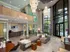 Resident lounge at our apartments for rent in Atlanta, featuring cushioned chairs and flat screen TV.