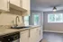 vacant kitchen and dining room