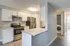 vacant kitchen with bar