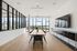 Conference Room with long table and floor to ceiling windows