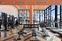 Fitness Center with gym equipment and floor to ceiling windows