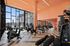 Fitness Center with gym equipment and floor to ceiling windows