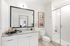 Bathroom with single vanity and standing shower