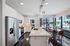 Kitchen with island and double door refrigerator