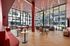 Clubhouse with long table and rope lights hanging from the ceiling