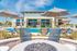 poolside firepit with surrounding seating