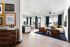 spacious living room with large windows overlooking downtown durham