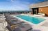 Resort Inspired Pool and Tanning Deck