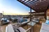 Rooftop seating area during sunset