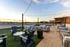 Rooftop seating area during sunset