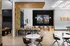 Resident clubroom with ample tables and seating