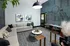 Mini lounge with sectional sofa and workspace table