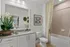 Bathroom with tub and single vanity