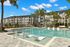 Swimming pool with aqua lounge chairs