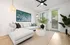 Living room with ceiling fan and wood plank flooring