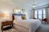Spacious bedroom with ceiling fan