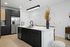 Unit interior kitchen, quartz countertops, dual tone cabinets, designer backsplah