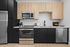 Unit interior kitchen, quartz countertops, dual tone cabinets, designer backsplah