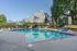 Pool deck with lots of seating
