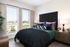 bedroom with large windows
